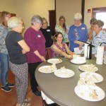 Deb Ravin demonstrates propping up the specimens. Potter 07